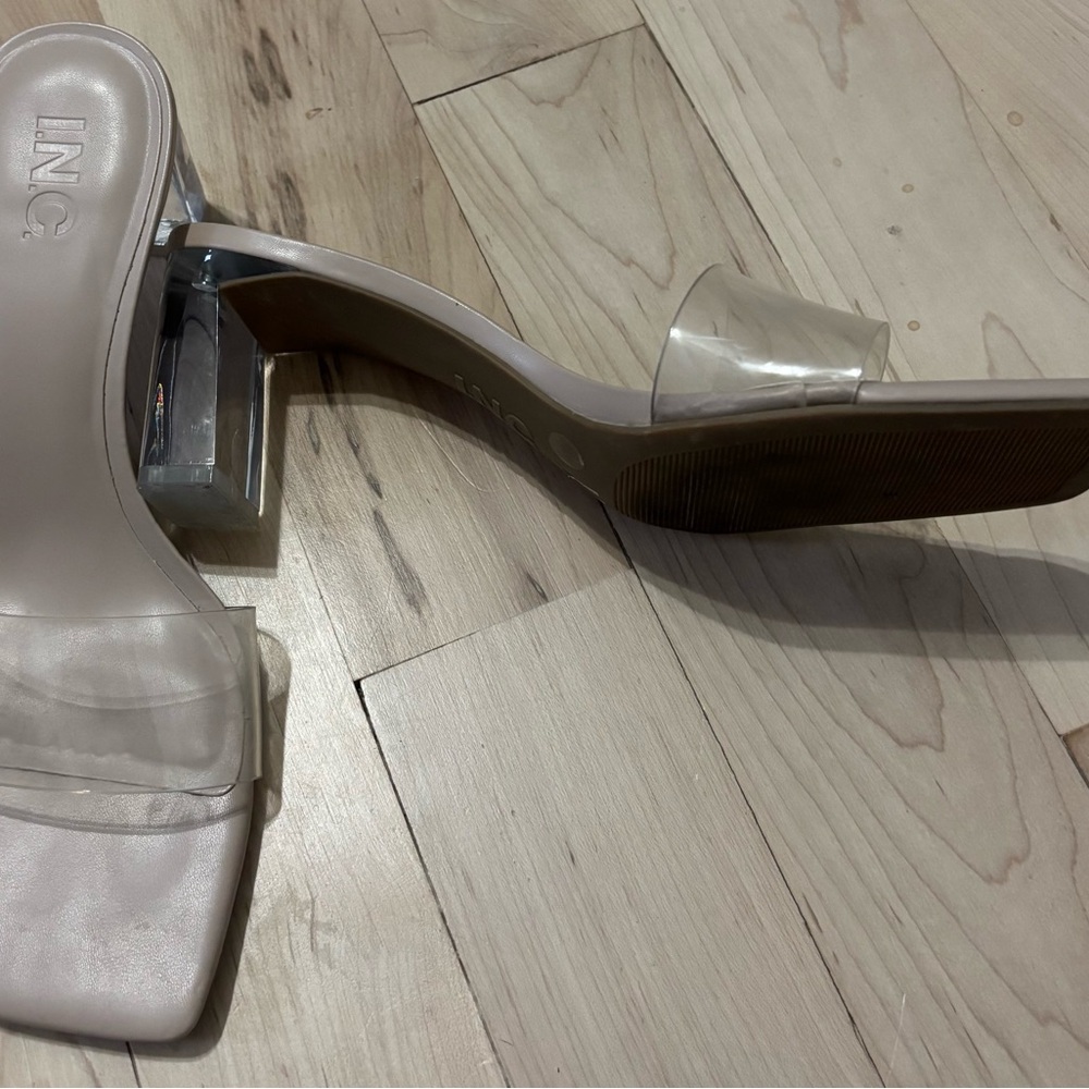 Clear sling back shoe perfect for formal season. Goes well with any color.